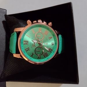 Green and Rose Gold Chronograph Watch